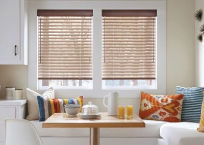 brown aluminum blinds on kitchen windows