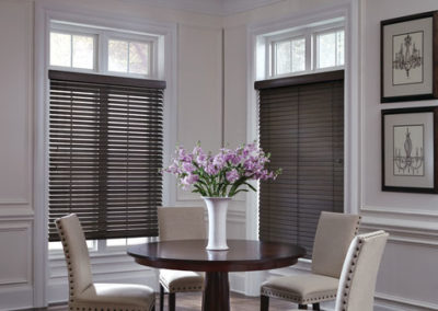 gray wood blinds on dining room windows